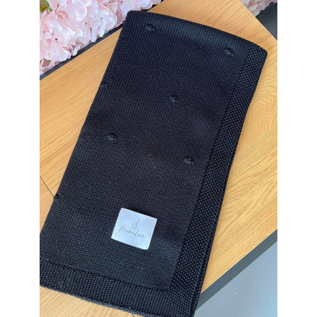 Babydecke aus Merinowolle Schwarz mit Pünktchen