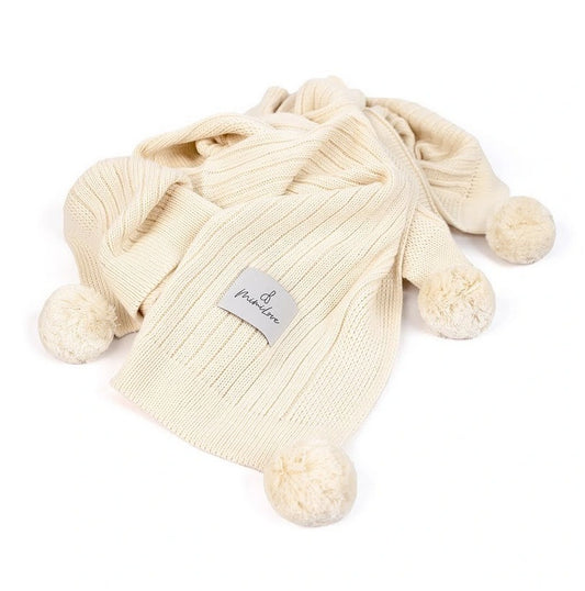 Bambusdecke mit Pompons Cremig